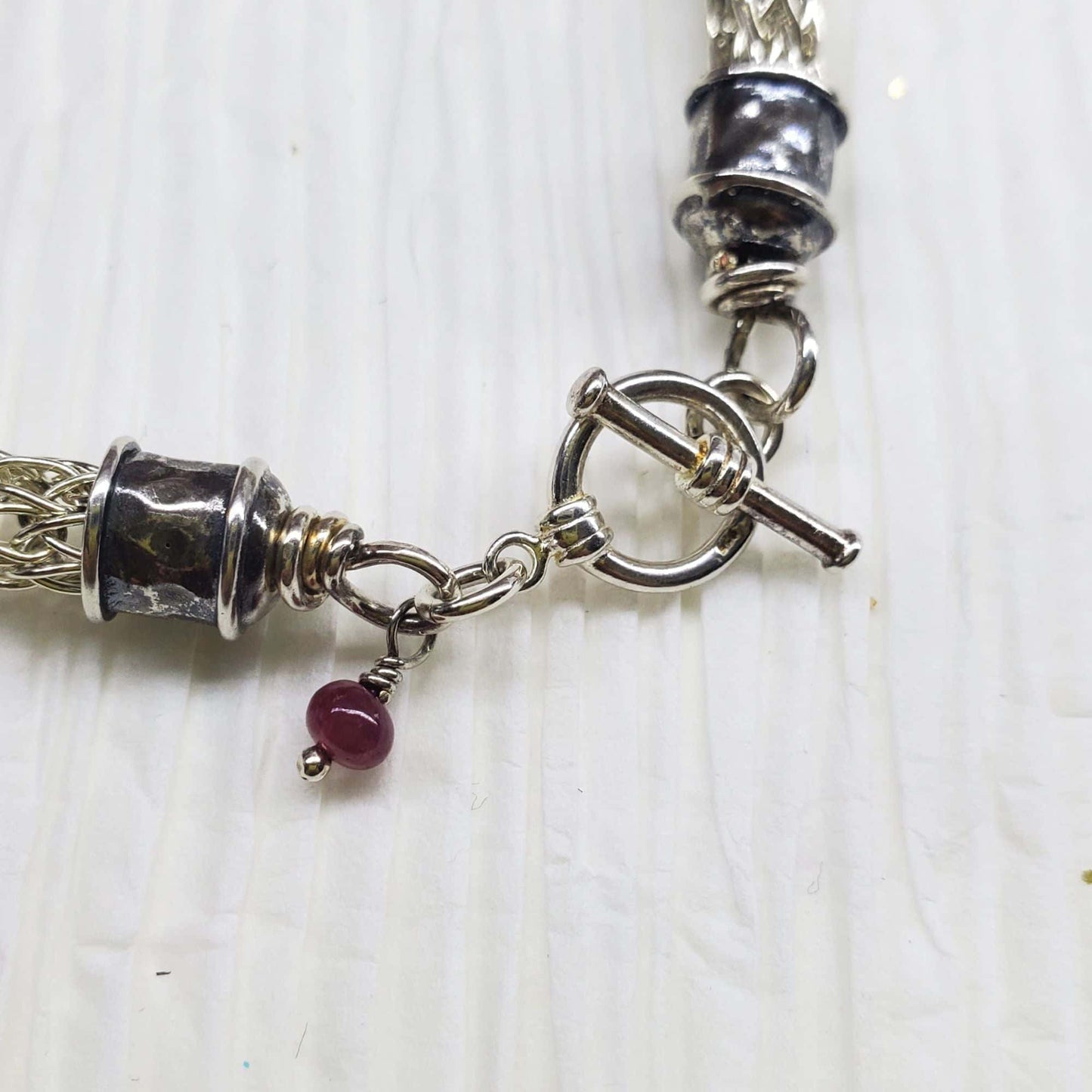 Handmade 10mm silver Viking knit bracelet with Ruby charm