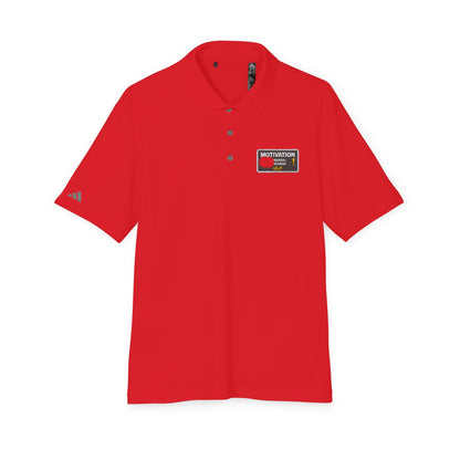 Motivation Is a Universal Language Polo — Unisex Performance Polo