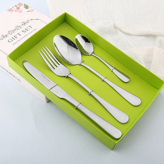 Four stainless steel cutlery