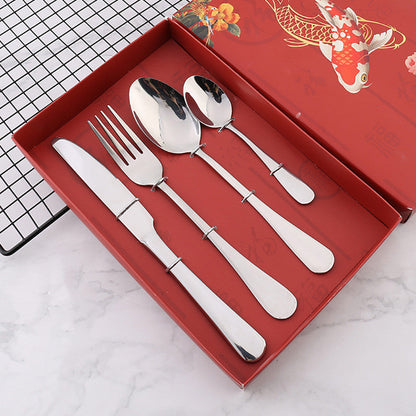 Four stainless steel cutlery