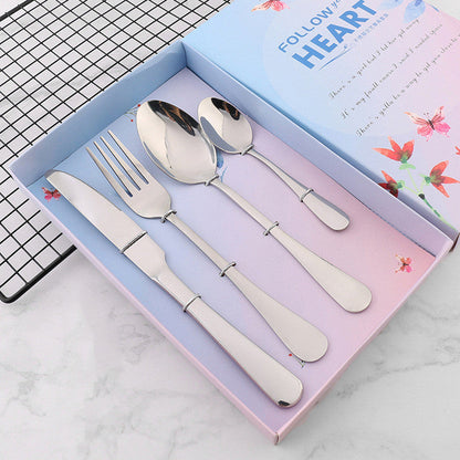 Four stainless steel cutlery