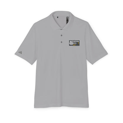 Motivation Is a Universal Language Polo — Unisex Performance Polo
