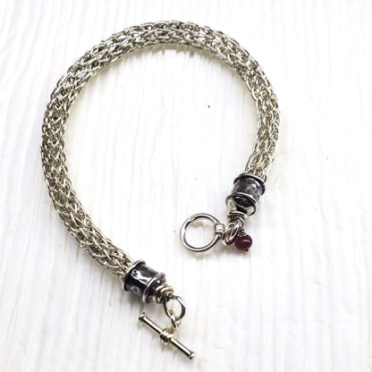 Handmade 10mm silver Viking knit bracelet with Ruby charm