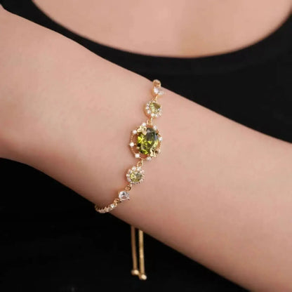 The three-piece set of gold-plated necklace, earrings and bracelet is an elegant wedding and party accessory for women.