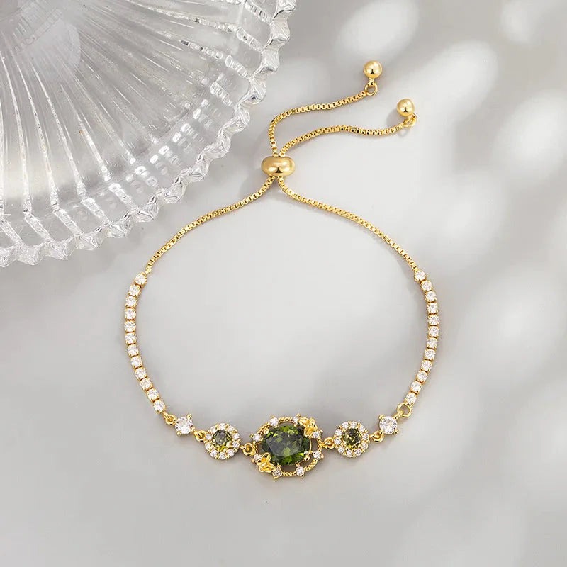 The three-piece set of gold-plated necklace, earrings and bracelet is an elegant wedding and party accessory for women.