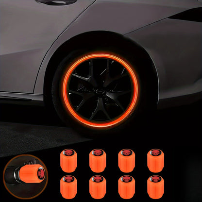 A Collection of Four Glowing Tire Valve Caps Designed to Stop Air from Escaping, Ideal for Vehicles Like Cars, Bikes, And Trucks, Adding a Fashionable Touch